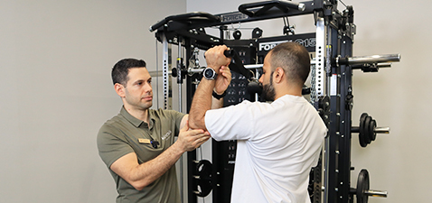 Strength training at Kinesis Clinic Dubai.