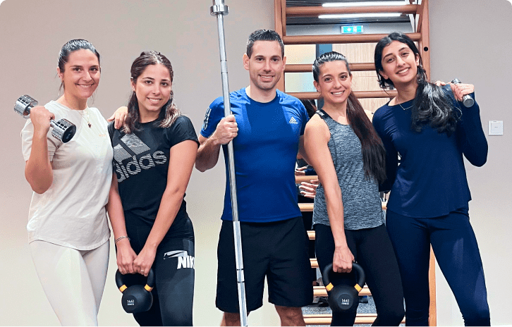 Strength training group at Kinesis Clinic Dubai.